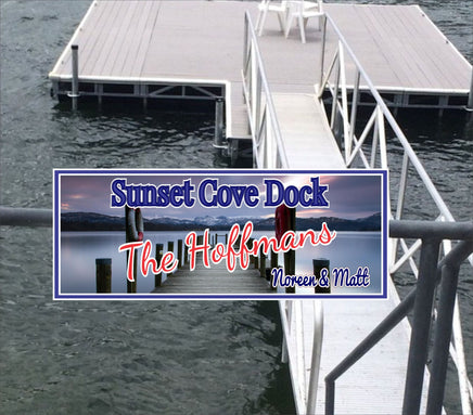 Personalized dock sign featuring a wood pier and life preserver on a calm lake, with fully editable text.