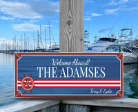 Custom Welcome Aboard boat sign featuring a ship wheel and anchor border, available in rectangular or square shapes.