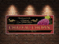 Personalized Wine Chateau Welcome Sign featuring grape motifs and elegant flourishes in purple and gold, with fully editable text for customization.