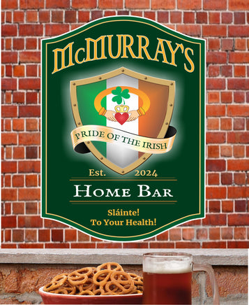 Personalized Irish bar sign with editable text, featuring the Irish flag, a Claddagh ring, and the quote "To your health!" on a rich green background. Perfect for home bars or Irish pubs.