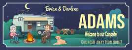 Custom RV camper sign featuring a cartoon couple, campfire, and picnic table with editable text