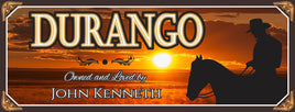  Custom horse stall sign with personalized text, featuring a sunset background and a silhouette of a horse and rider. The horse's name is displayed prominently, with "Owned and Loved By" and the owner's name beneath.