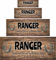  Personalized horse stall sign with a rustic brown weathered wood background, barbed wire accents, and custom text. Features the horse's name in a bold Western-style font and "Loved and Owned By" in an elegant script.