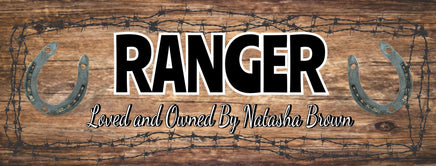  Personalized horse stall sign with a rustic brown weathered wood background, barbed wire accents, and custom text. Features the horse's name in a bold Western-style font and "Loved and Owned By" in an elegant script.