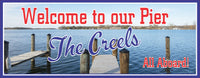  Personalized pier welcome sign for boat owners with a photographic lake background, blue skies, and wooden pier. Customizable text for a unique nautical touch. Perfect for docks and boathouses.