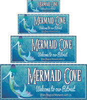 Custom blue beach house sign featuring a whimsical mermaid with a shimmering tail and cascading hair. The sign has a scroll design border evoking ocean waves and elegant, customizable fonts for your family name and personalized text. Perfect for beach houses, coastal retreats, beach bars, or sailboats.