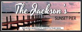 Personalized Sunset Pier Sign with reflective ocean waters, featuring a serene sunset and custom family name, perfect for home or office decor.