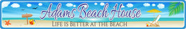 Personalized aluminum beach sign featuring an illustration of a beach with an ocean backdrop, beach chair and umbrella, sea shells, and a beach ball